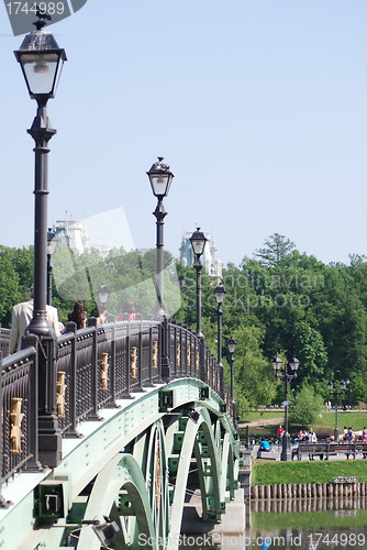 Image of bridge in Moscow city park  at the summer