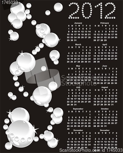Image of vector calendar 2012 with white pearls on black background 