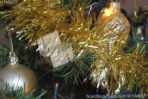 Image of christmas tree decorated with tinsel