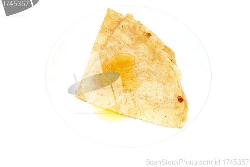 Image of pancake with a honey                