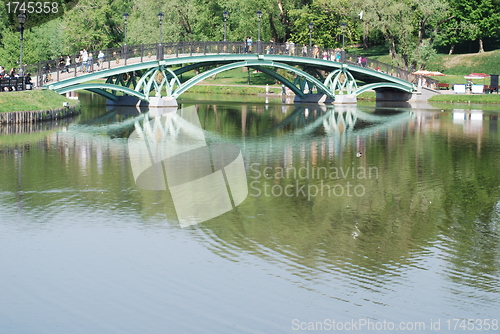 Image of bridge in Moscow city park  at the summer