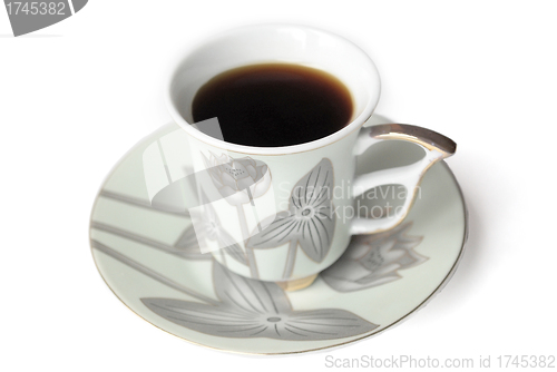 Image of coffee cup and saucer with pattern