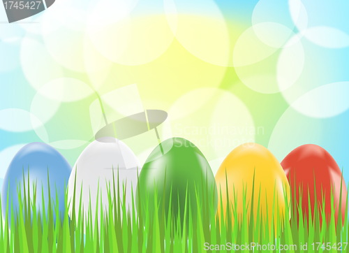 Image of Colored easter eggs on green background with grass    