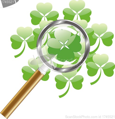 Image of luck search -  four leaf of clover or shamrock under  magnifying glass 