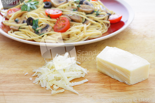 Image of Parmesan cheese and pasta
