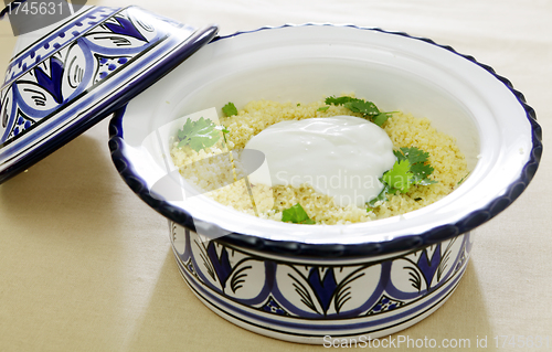 Image of Couscous topped with yoghurt