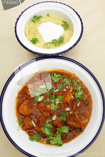 Image of Chicken tagine and couscous vertical