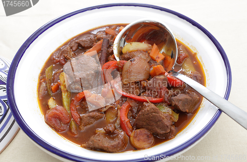 Image of Moroccan beef tagine with spoon