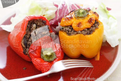Image of Stuffed red and yellow peppers