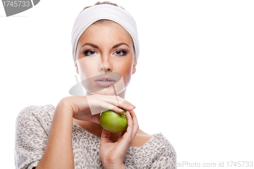 Image of Woman with green apple.