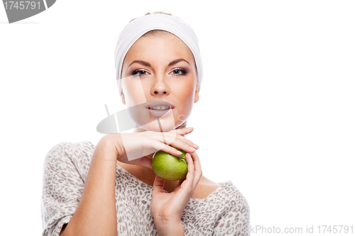 Image of Woman with green apple.