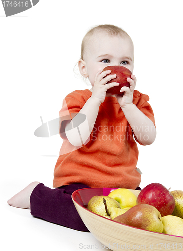 Image of baby with apples