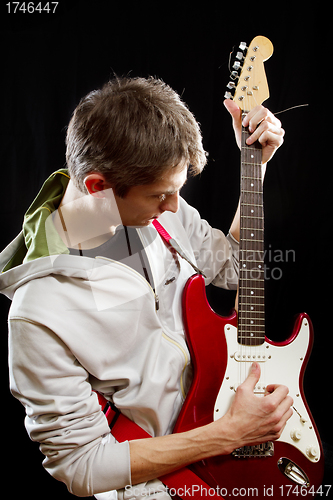 Image of Man With The Guitar