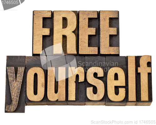 Image of free yourself in wood type