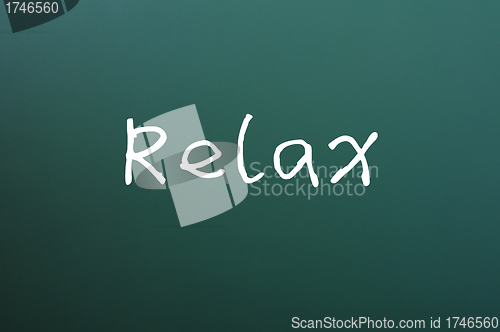 Image of Relax - word written on a blackboard