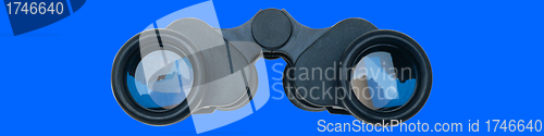 Image of Black binoculars on blue background.