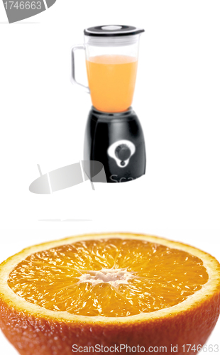 Image of orange fruit and blender