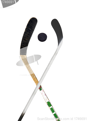 Image of Hockey stick and puck on white