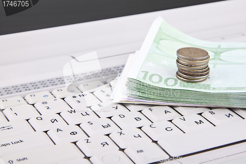 Image of money on keyboard