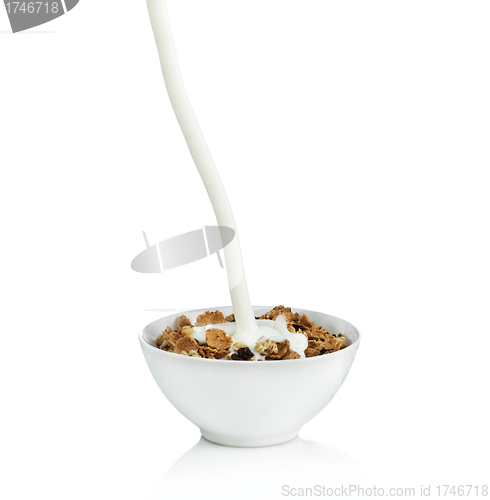 Image of Healthy Breakfast-Cornflakes and Milk Splash