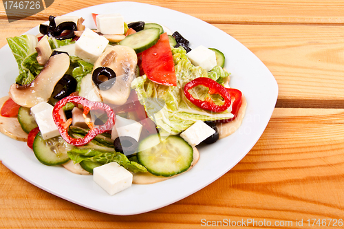 Image of vegetable salad with mushrooms close up