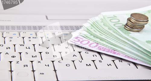 Image of money on keyboard