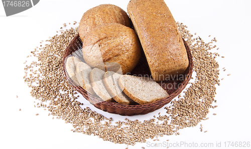 Image of Assortment of baked bread with wheat isolated