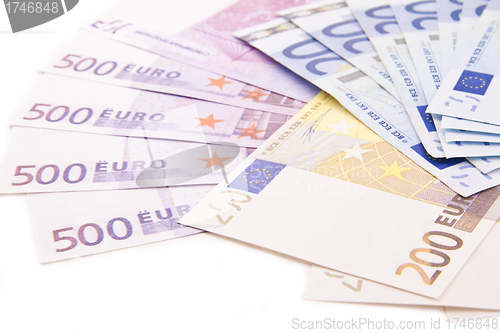 Image of European currency banknotes on white