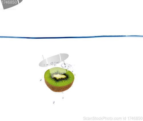 Image of kiwi slice splash in water-isolated on white background