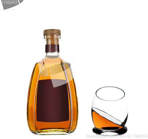 Image of Whiskey bottle and a whiskey glass