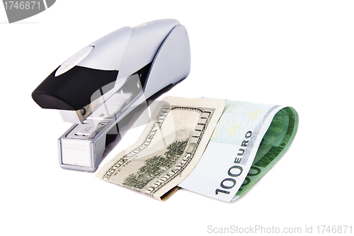 Image of Stapler with stack of euros isolated on white background