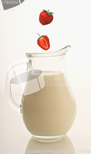 Image of Jug of milk and strawberry