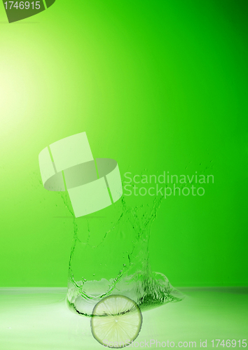 Image of lime in the water splash