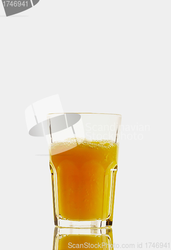 Image of Glass with orange juice on the white