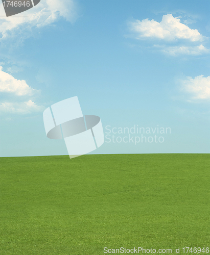 Image of green field and blue sky