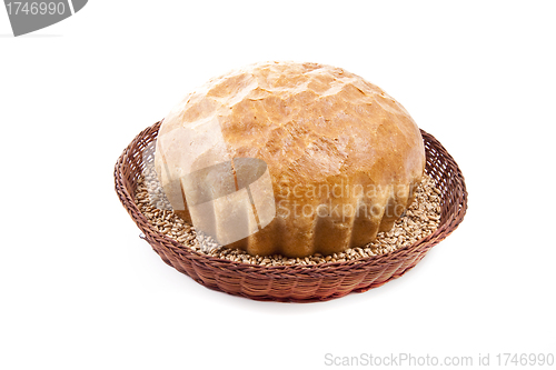 Image of fresh baked roll with grain in a basket