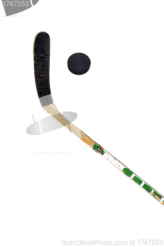 Image of Hockey stick and puck on white