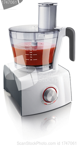 Image of Blender with red fruit smoothie isolated on white