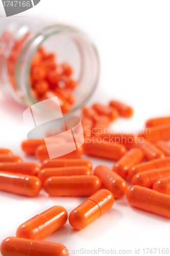 Image of bunch of orange pills