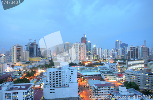 Image of sunset over a city in central america 