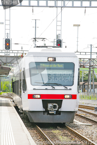 Image of Train locomotive coming to Lausanne platform Station Switzerland