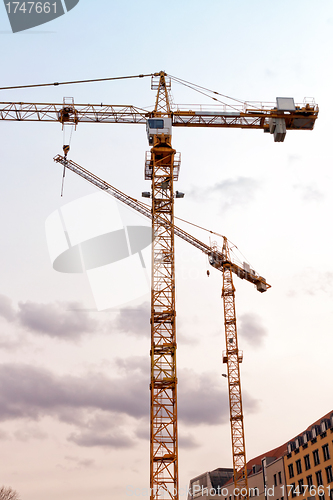 Image of Two construction cranes