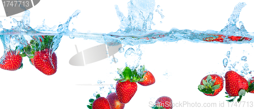Image of Collage Fresh Strawberry Dropped into Water with Splash