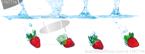 Image of Collage Fresh Strawberry Dropped into Water with Splash
