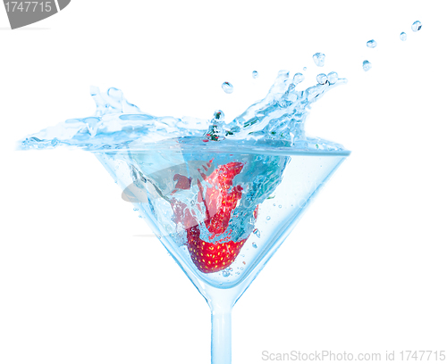 Image of Fresh Strawberry Dropped into Glass with Splash