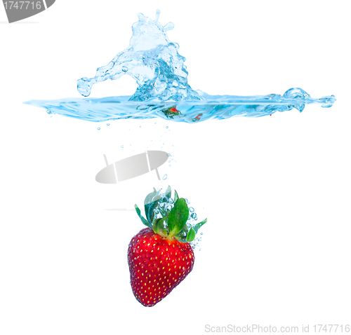 Image of Fresh Strawberry Dropped into Water with Splash