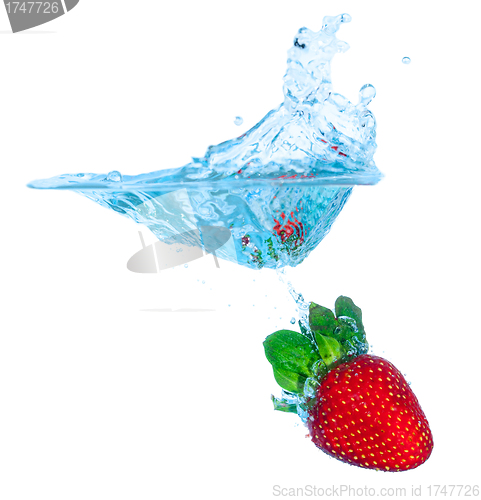 Image of Fresh Strawberry Dropped into Water with Splash