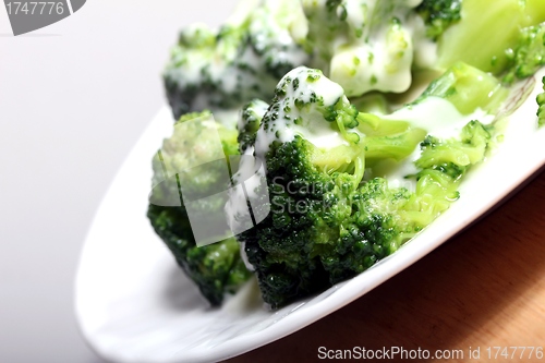 Image of broccoli with a light sauce