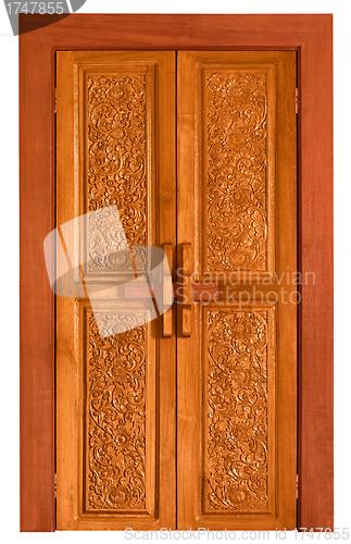 Image of Old wooden door with carvings