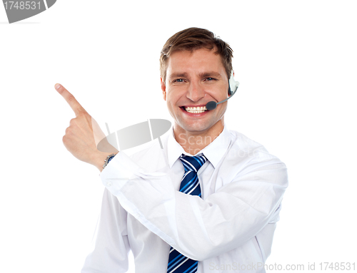 Image of Customer service agent pointing away